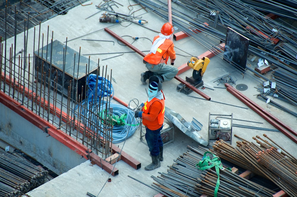 Professionals reviewing site plans on site